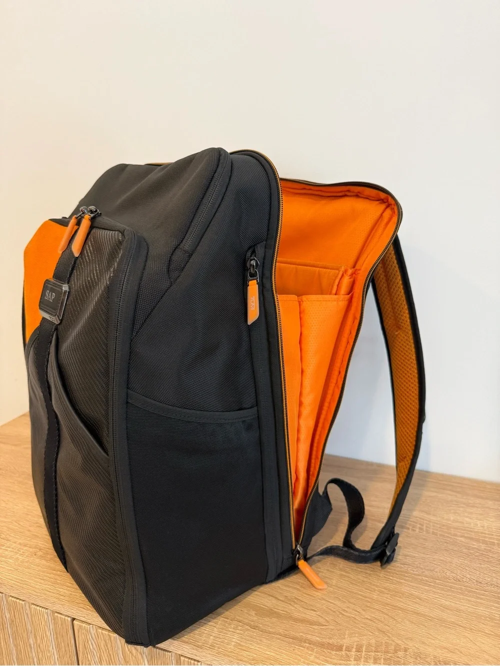 Tumi Black and Orange Men's Backpack with Detachable Travel Pouch
